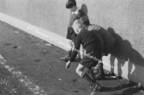 CHILDREN PLAYING IN STREET